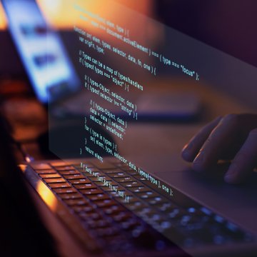 Projected computer code on a screen